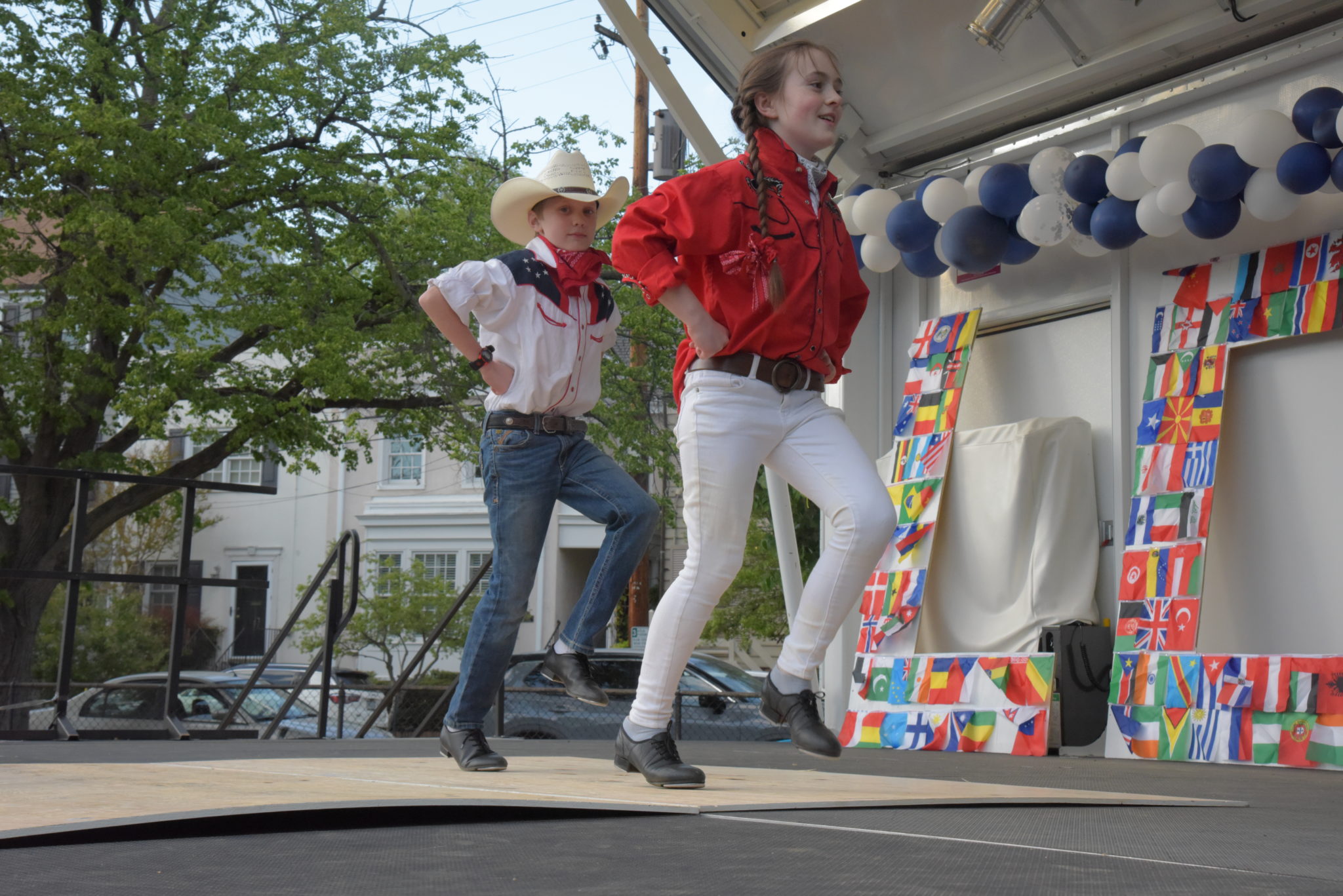 girl and boy tap dance