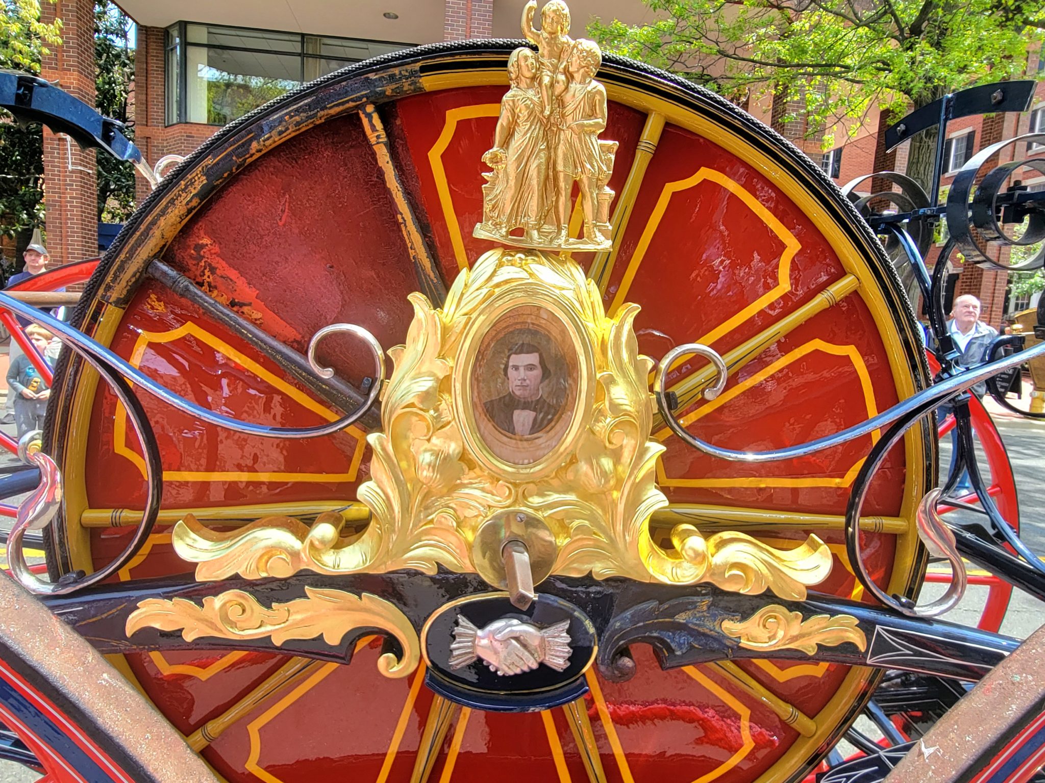 carriage with portrait of man in black and white