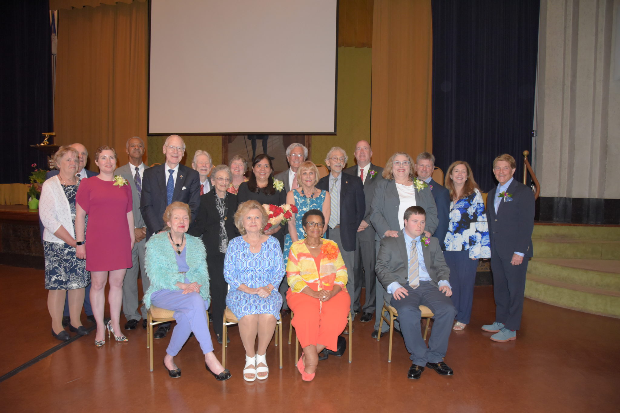 a group shot of the 2020 Living Legends of Alexandria inside the George Washington National Masonic Memorial