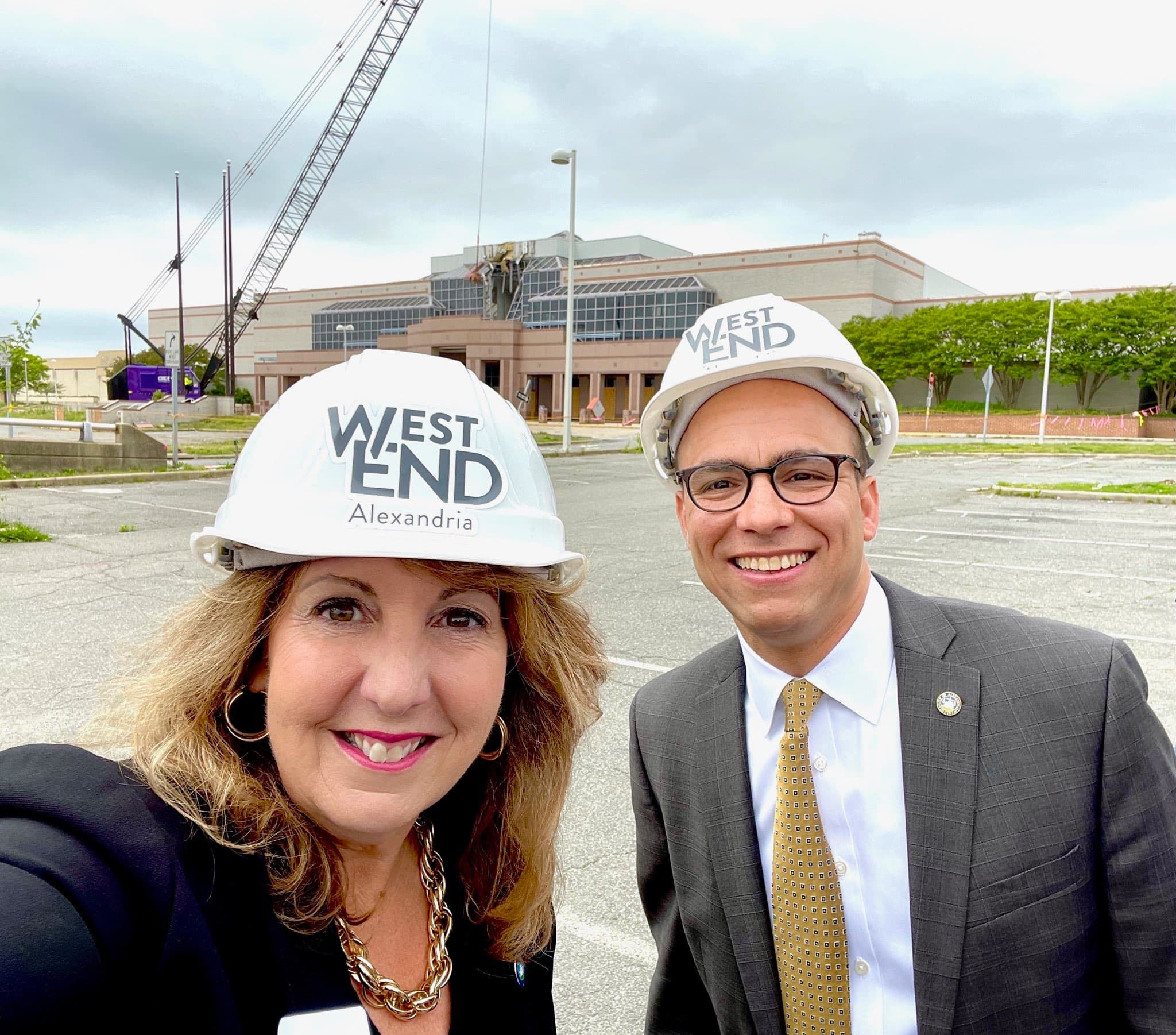 vice mayor and mayor of alexandria pose for a selfie in hard hats