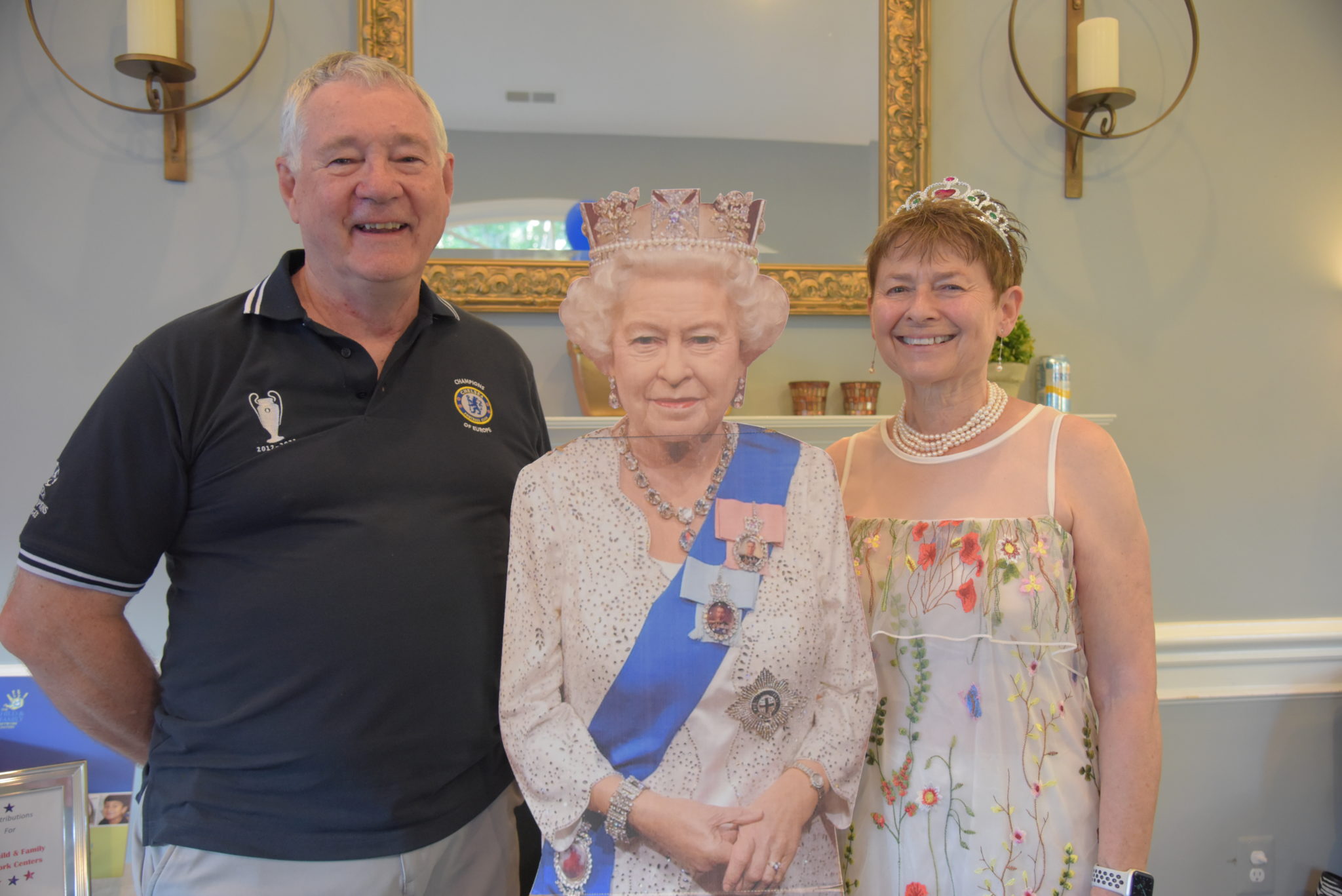 paul taylor, a cardboard cut out of queen elizabeth ii, and freda woodbridge