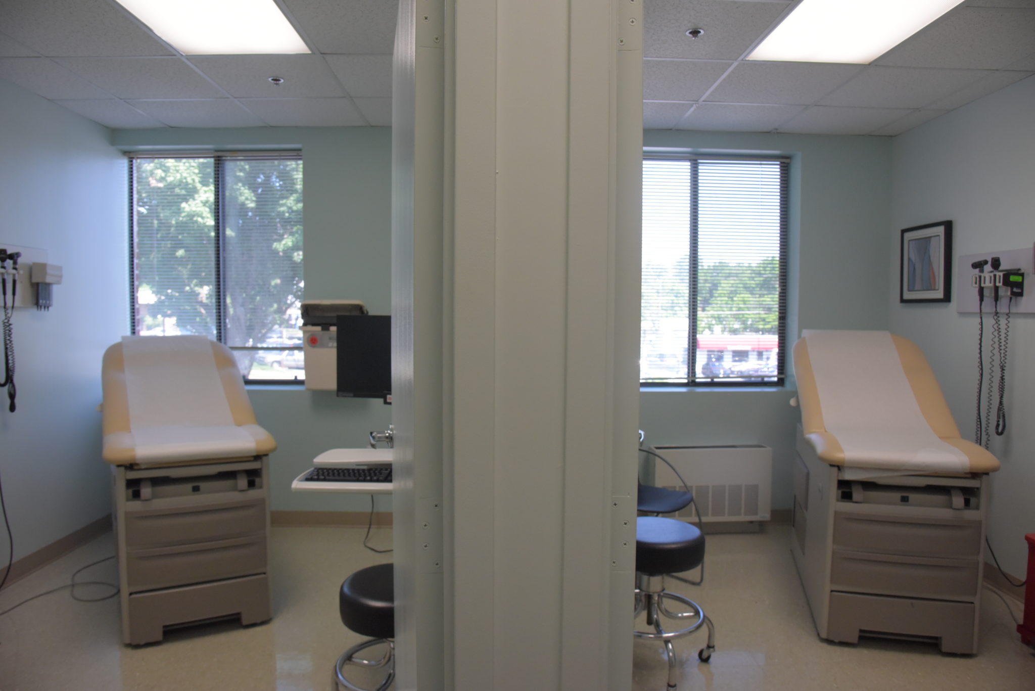 two doctors exam rooms