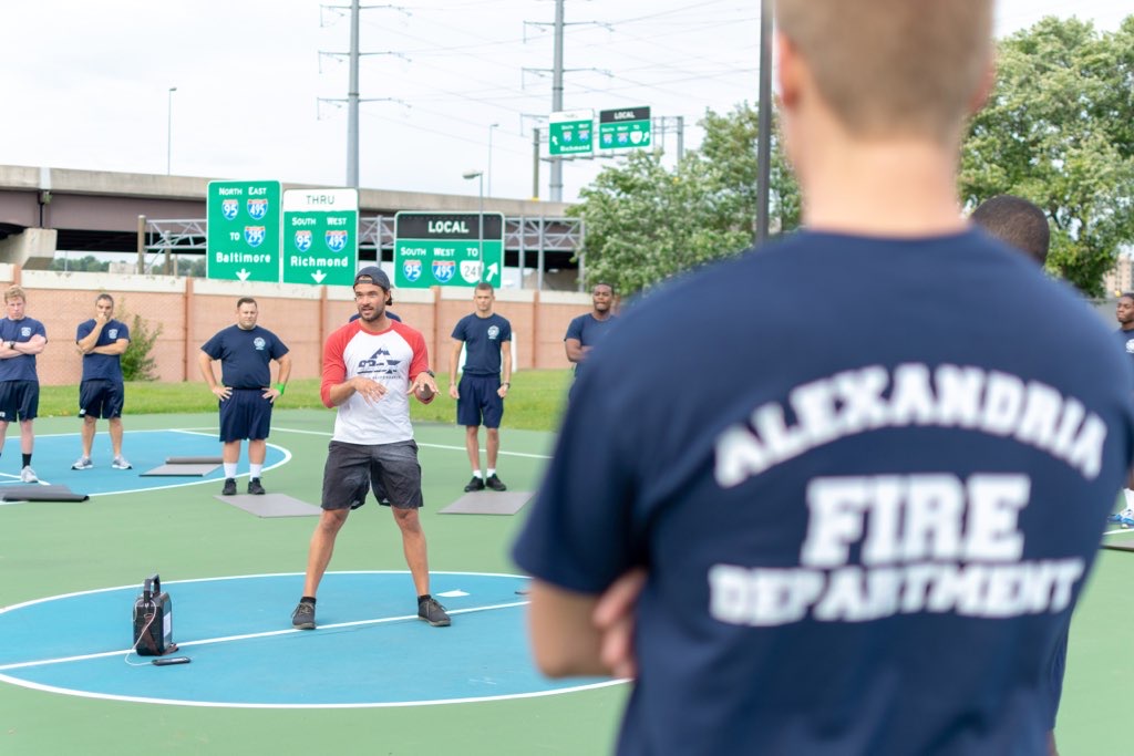 an alexandria fire department member looks on as recruits train in o2x program 2022