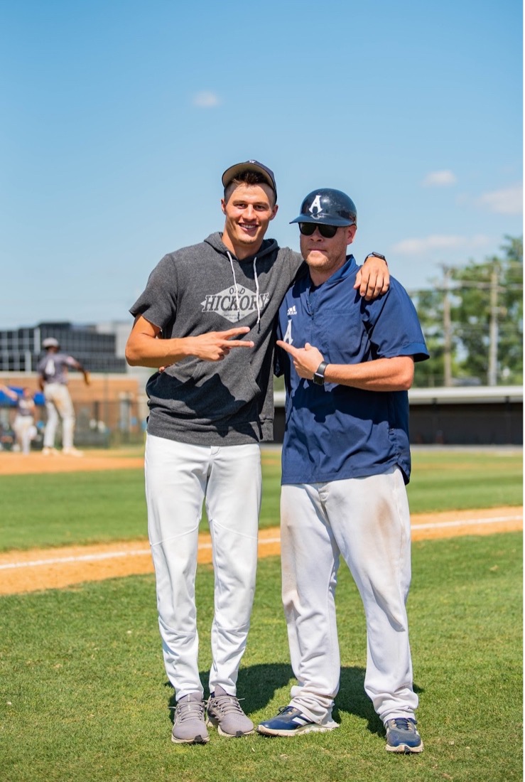 Alexandria Aces Manager Chris Berset (right) with pitcher Jacob Hartlaub (left)