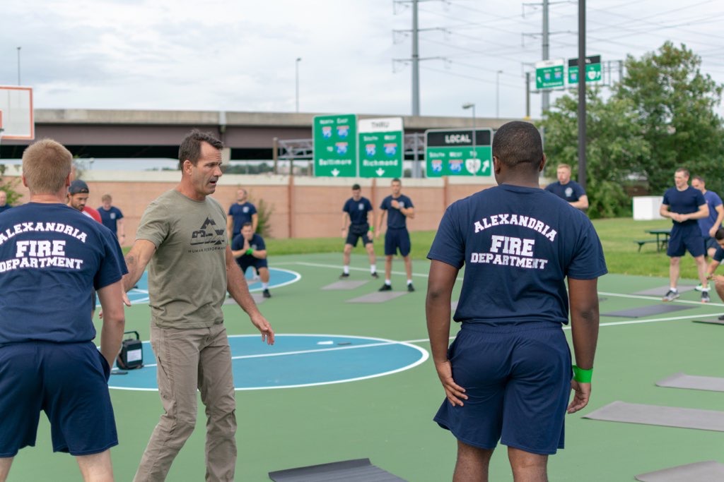 an alexandria fire department member looks on as recruits train in o2x program 2022