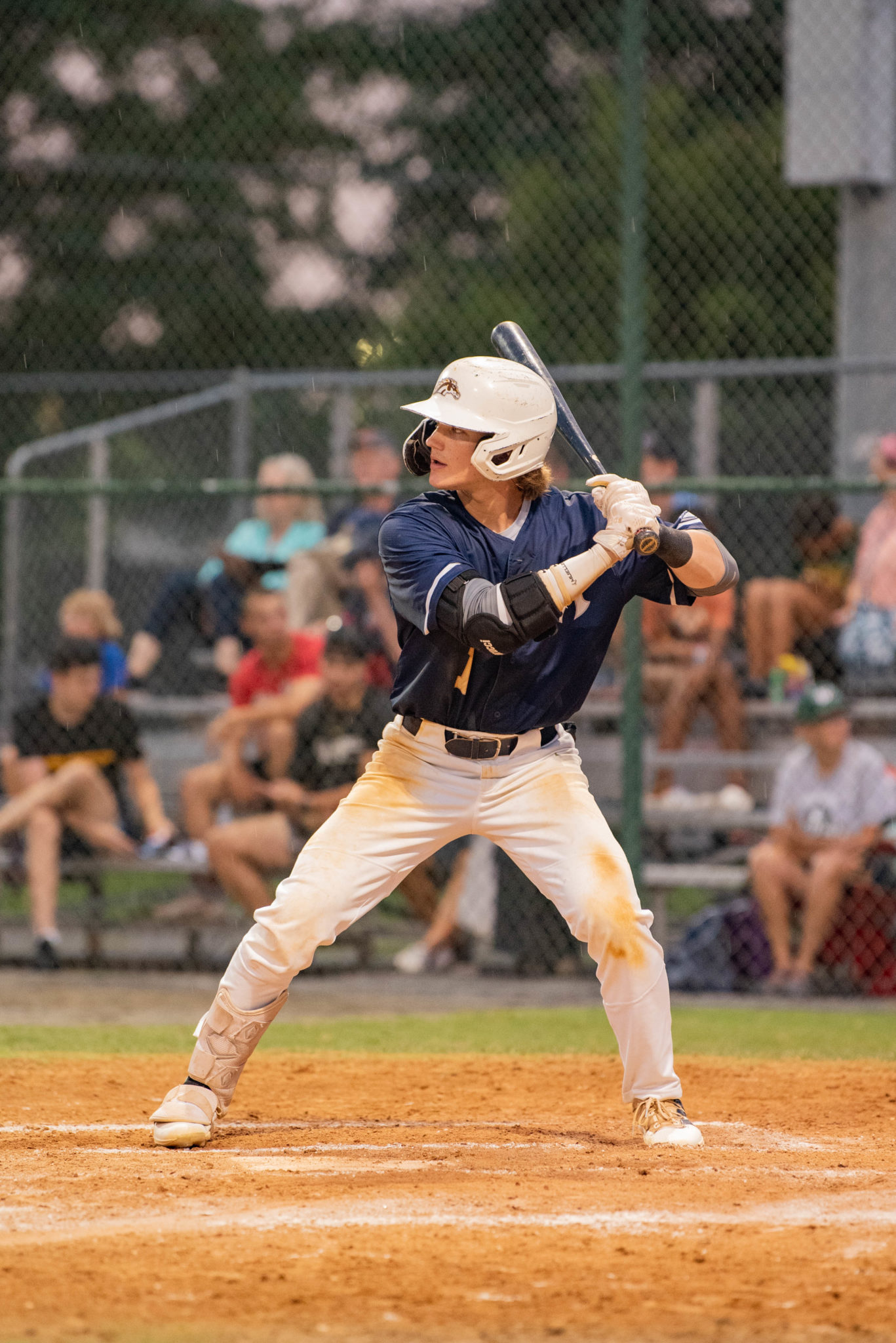 aces batter about to swing, bat poised behind his head