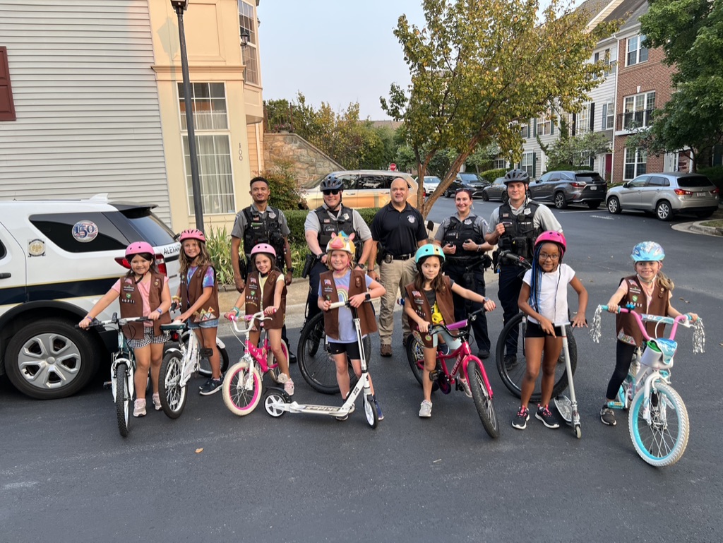 Girl Scouts Brownie Troop 60211 with Alexandria Police Officers and Bike Patrol at Townes at Cameron Parke