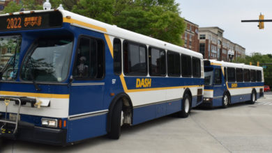 two DASHbuses lined up in Old Town Alexandria