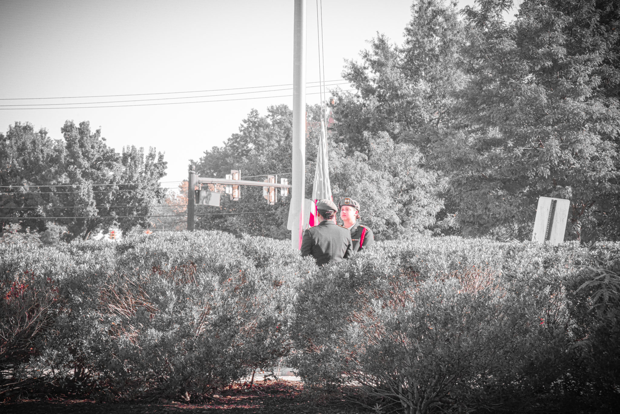 Flags outside ACHS being hoisted half mast for 9/11 (Photo Grace Billups Arnold)