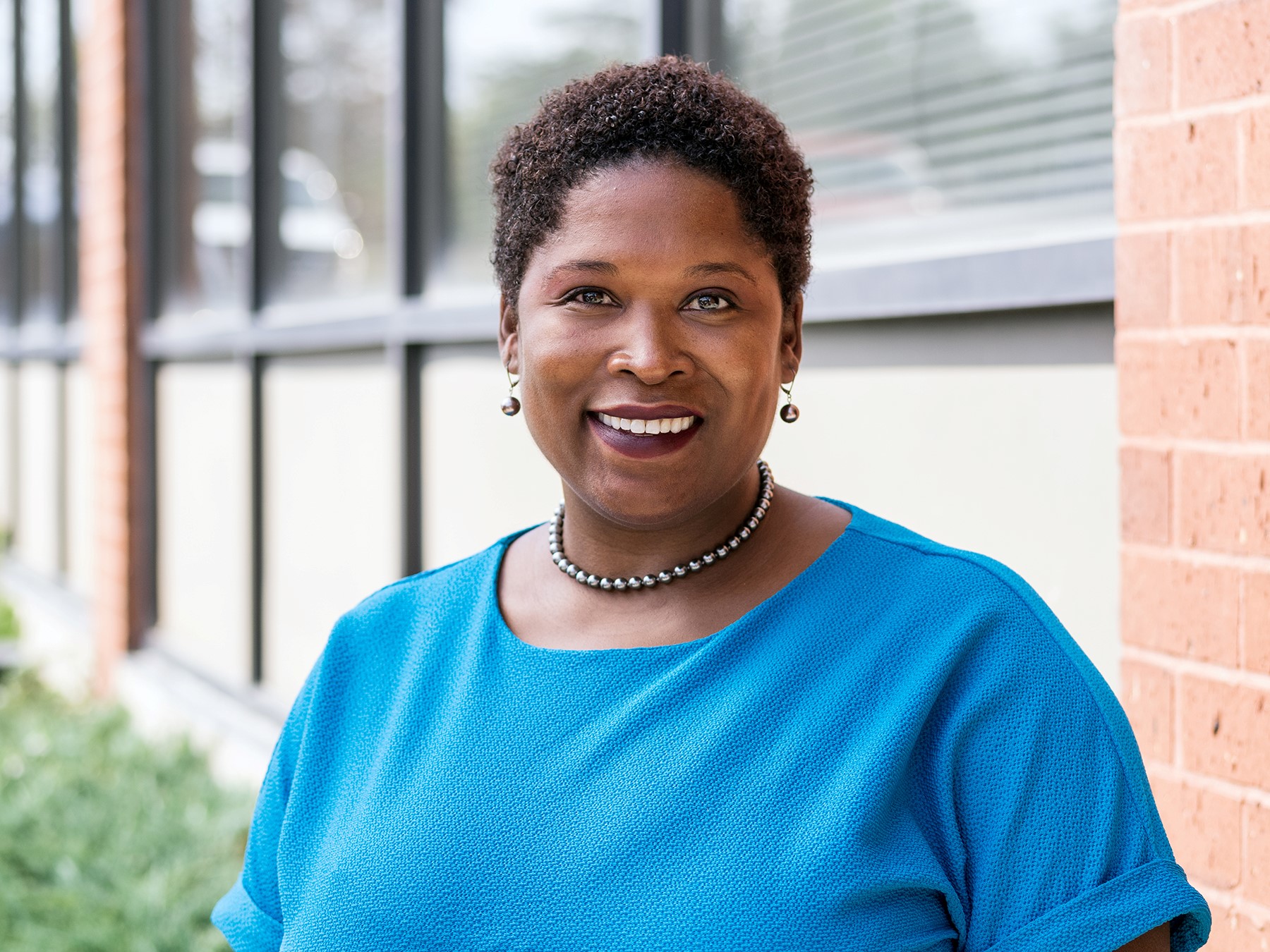 headshot of Kamilah McAfee of Wesley Housing