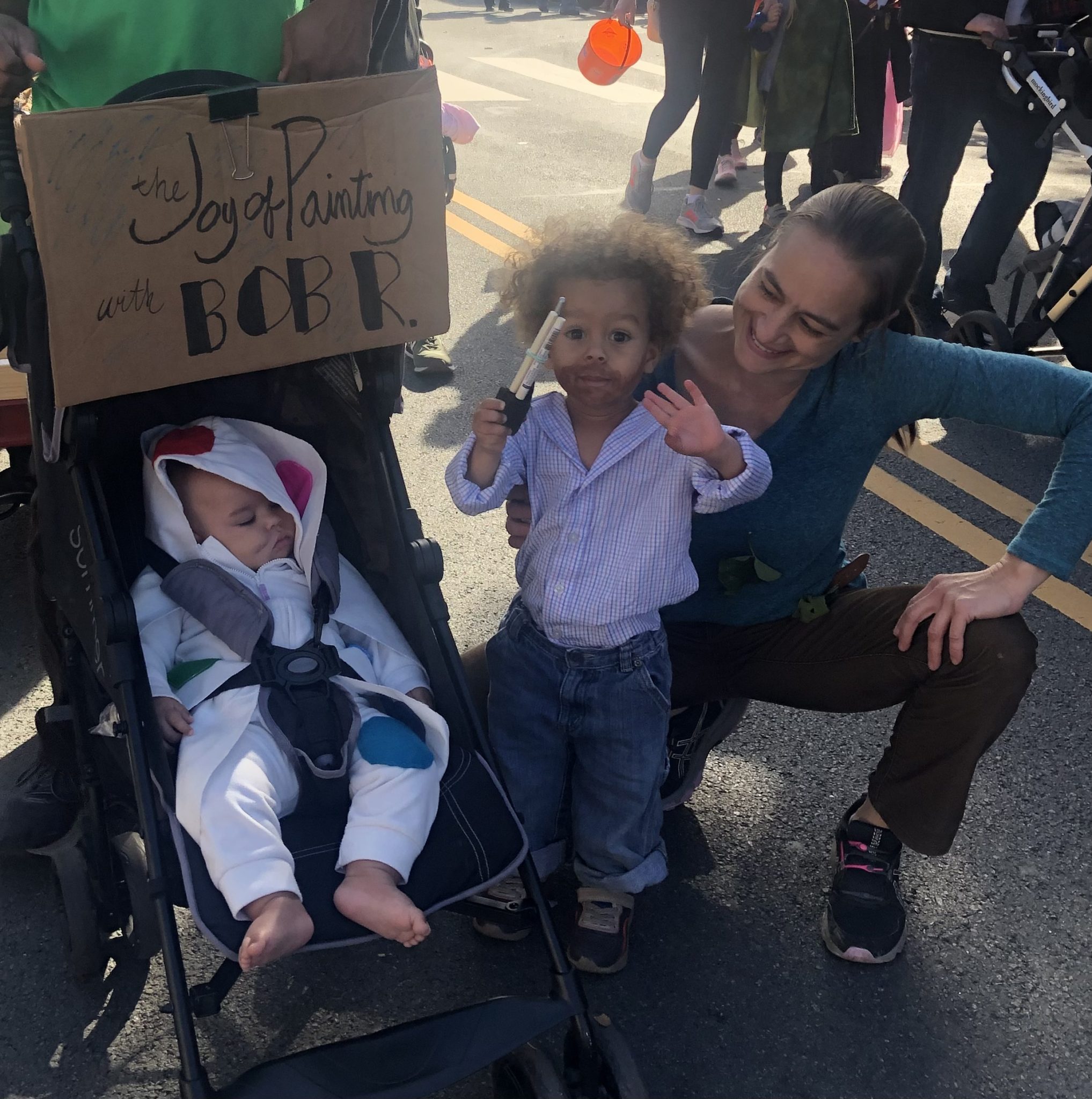 A little boy dressed up as Bob Ross for Halloween