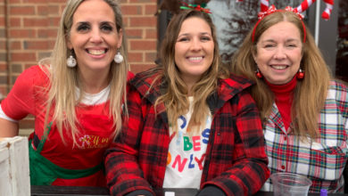 three ladies at Lena's check-in table