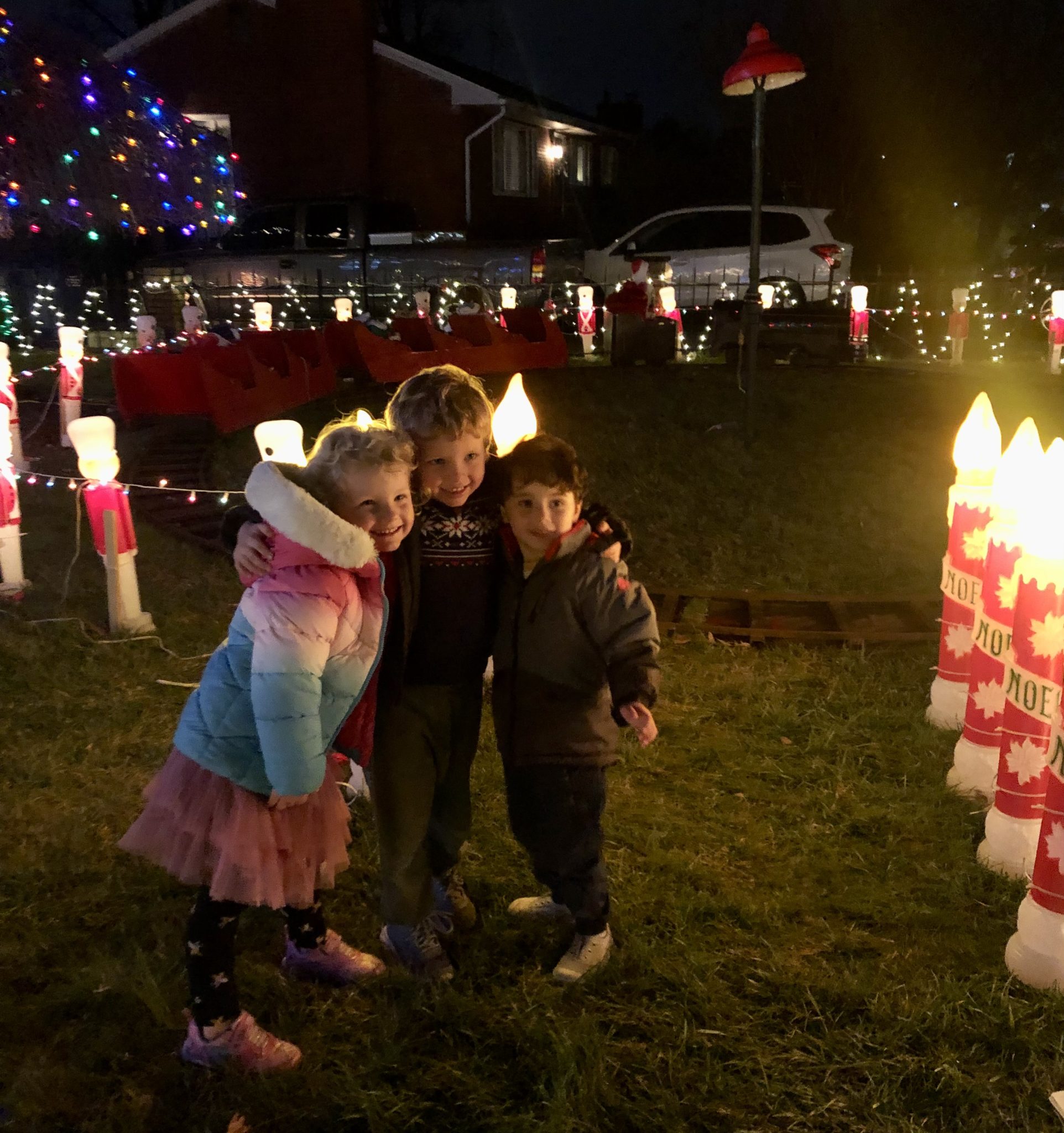 kids hugging in yard