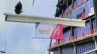 Last beam gets placed in first academic building of Virginia Tech's Innovation Campus in Alexandria, Virginia.