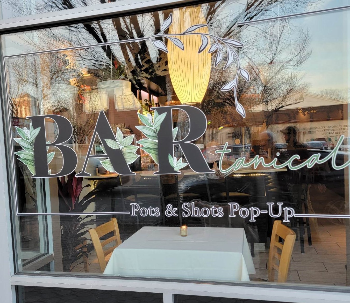 BAR-tanical written out on plate glass window of the new bar in Del Ray part of Alexandria.