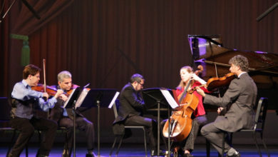 five musicians on stage