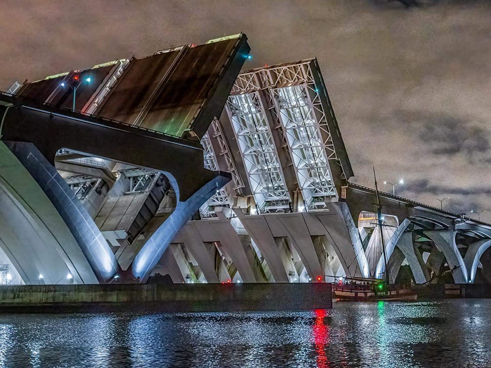 Tall Ship Providence emerging from the raised Woodrow Wilson Bridge heading to the Chesapeake at 11 P.M. on April 14, 2023. (Photo credit: Daniel Horowitz Art )