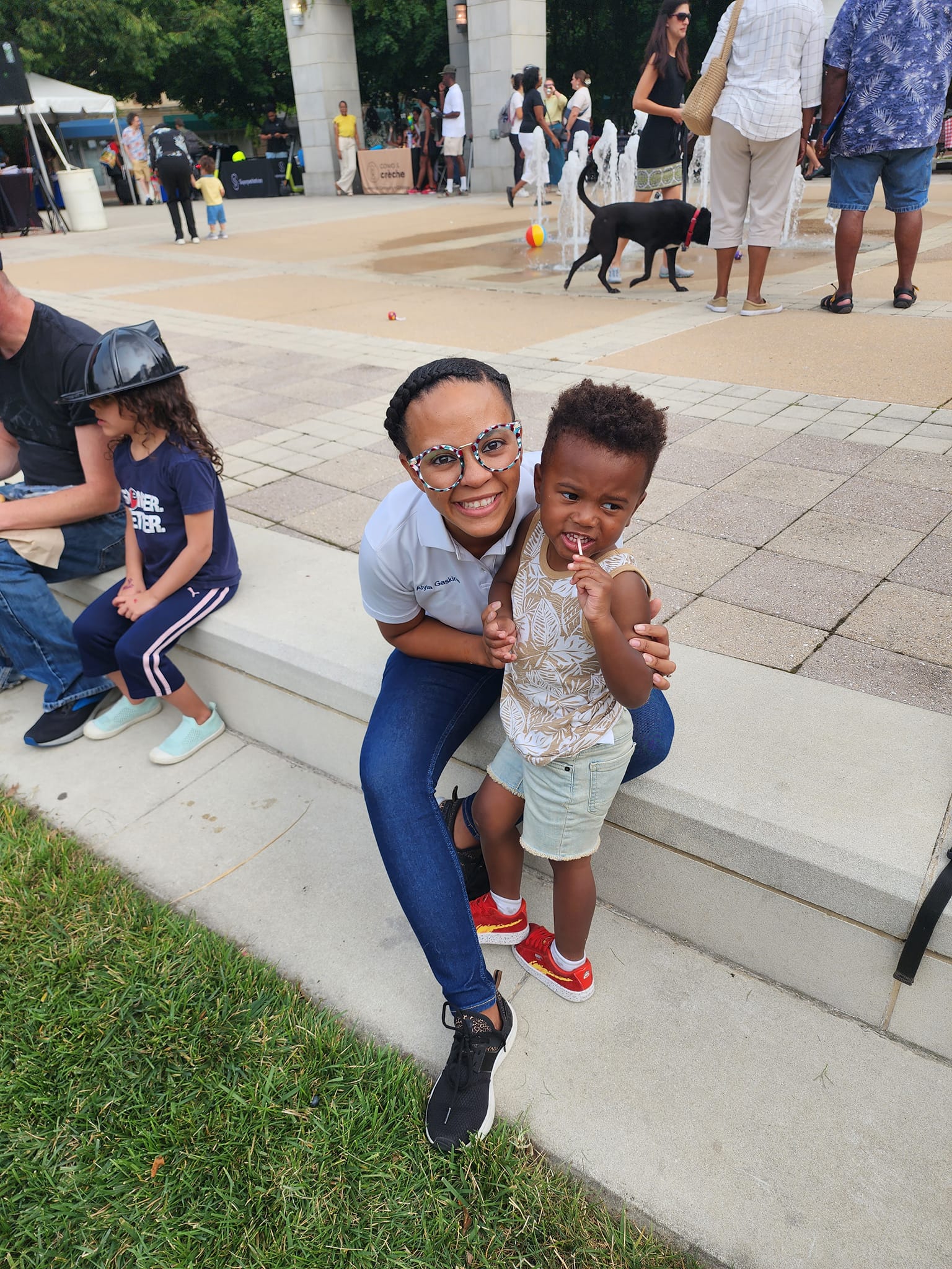 Alexandria Councilwoman Alyia Gaskins and young son in Carlyle (Photo Judith Fogel)