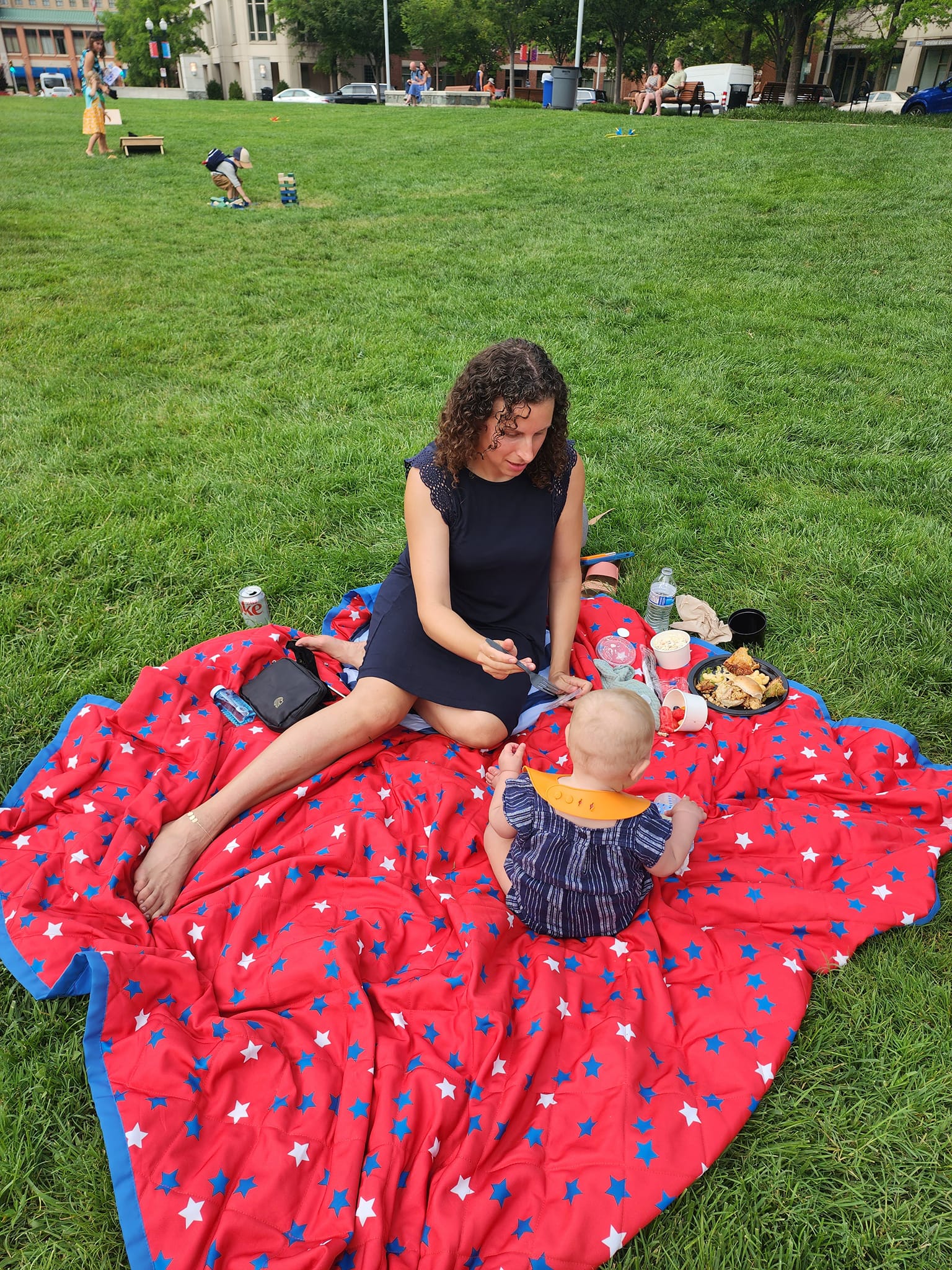 Staci Weber and nine-month-old daughter at Carlyle Square (Photo Judith Fogel)