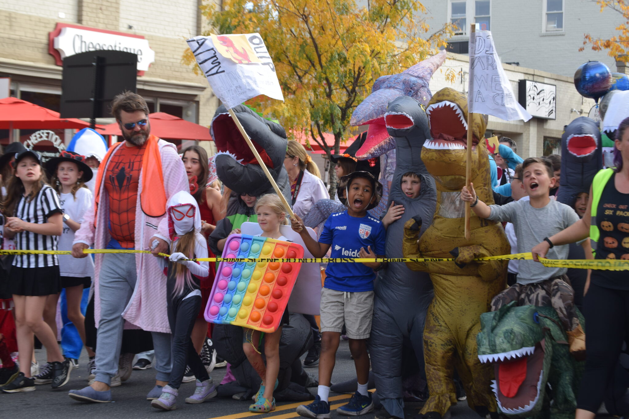 Children and adults dressed in various costumes.