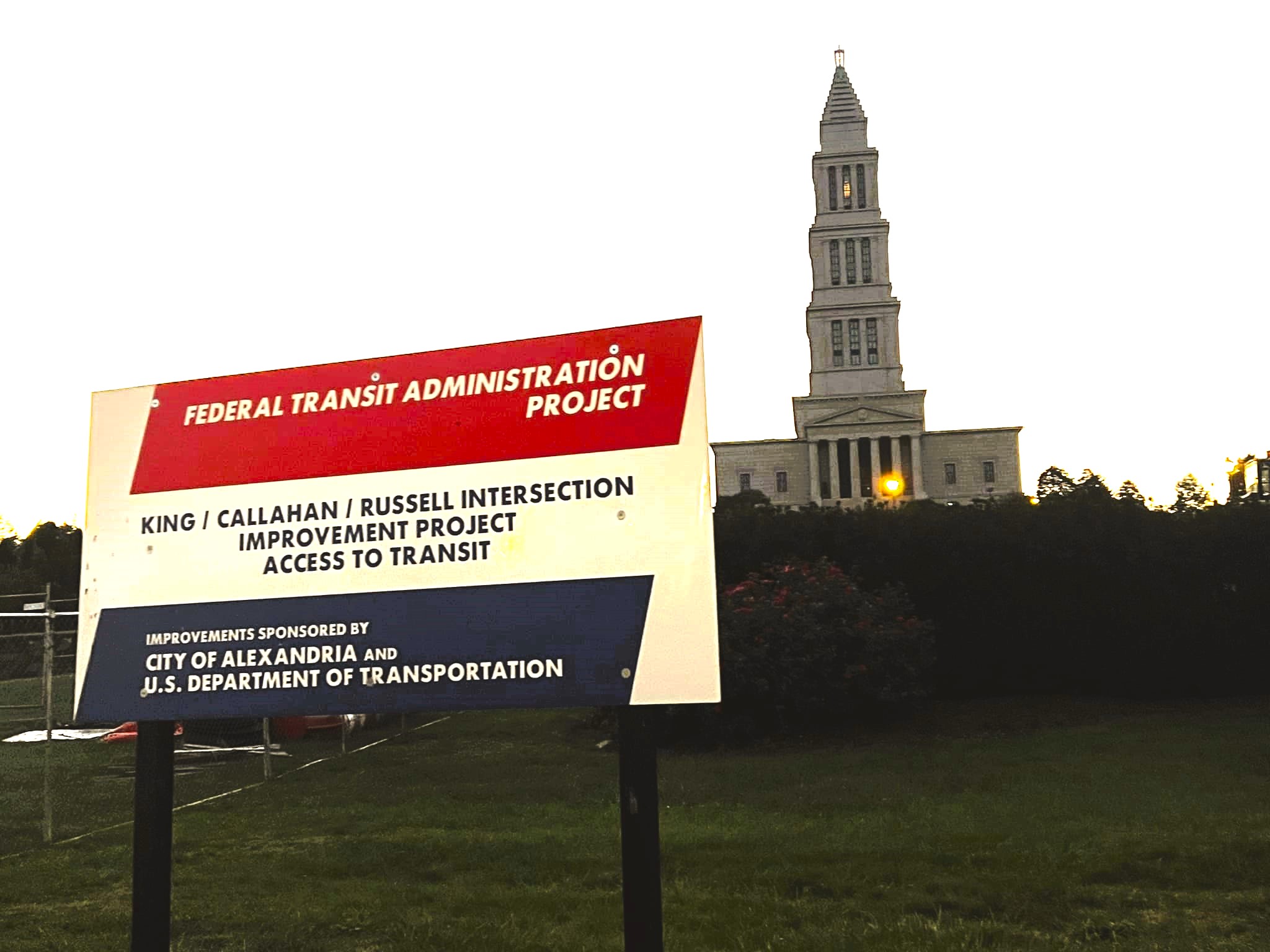 Federal Transit sign in forefront with George Washington Masonic Temple in background.