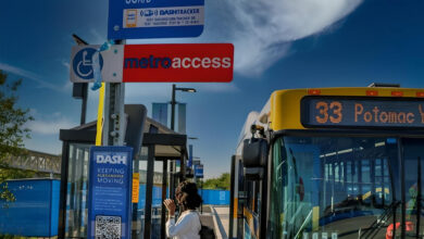 Passenger disembarking a DASH bus in Alexandria