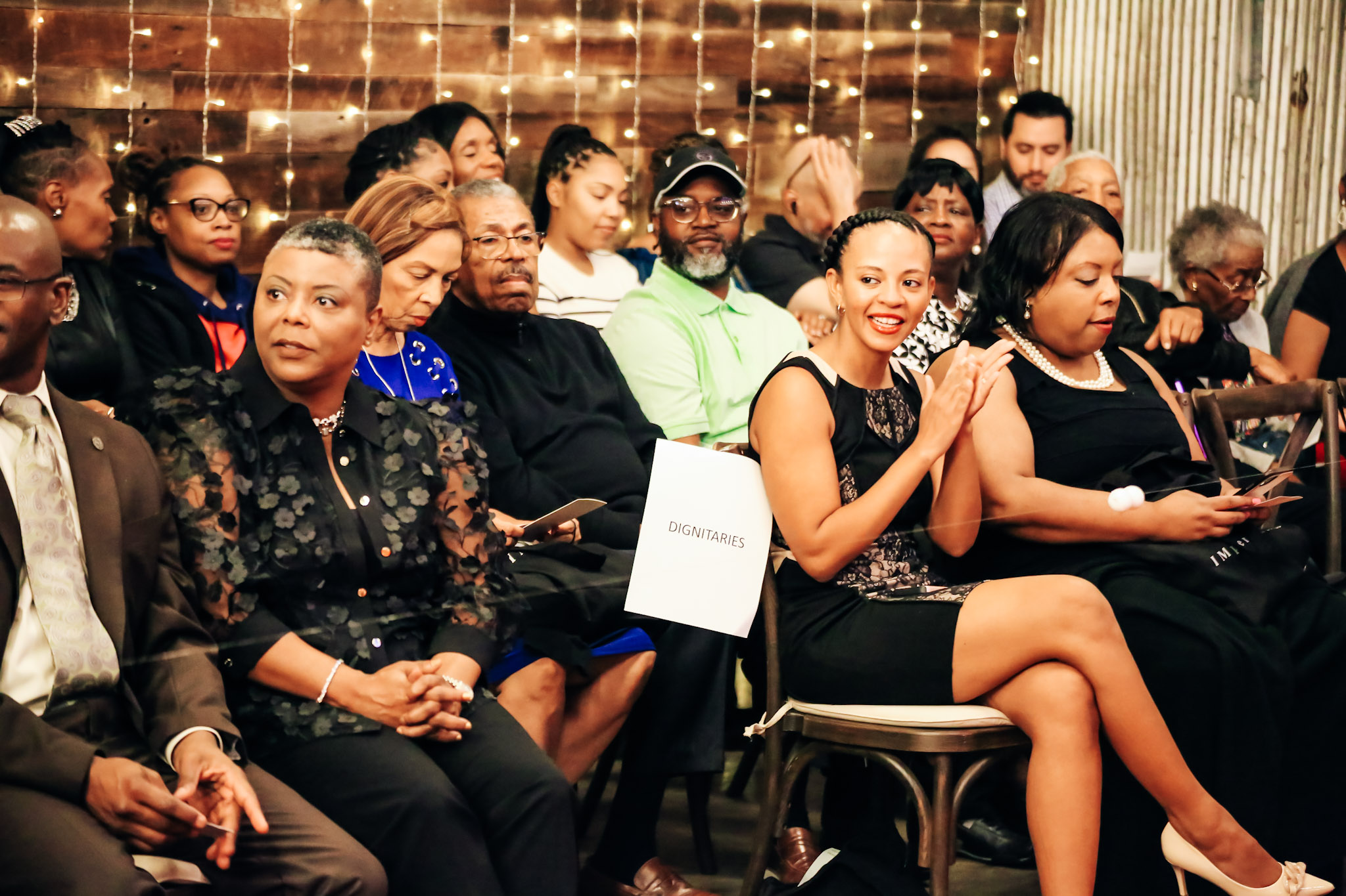 Crowd clapping at the Imperfecktlymade blind fashion show in Alexandria, Virginia.