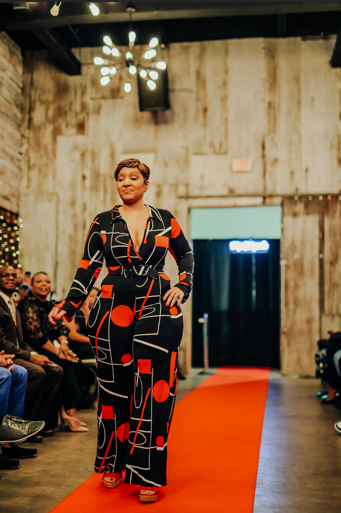 Beautiful Black lady on the runway at a local blind fashion show benefiting the Imperfektlymade Foundadtion.