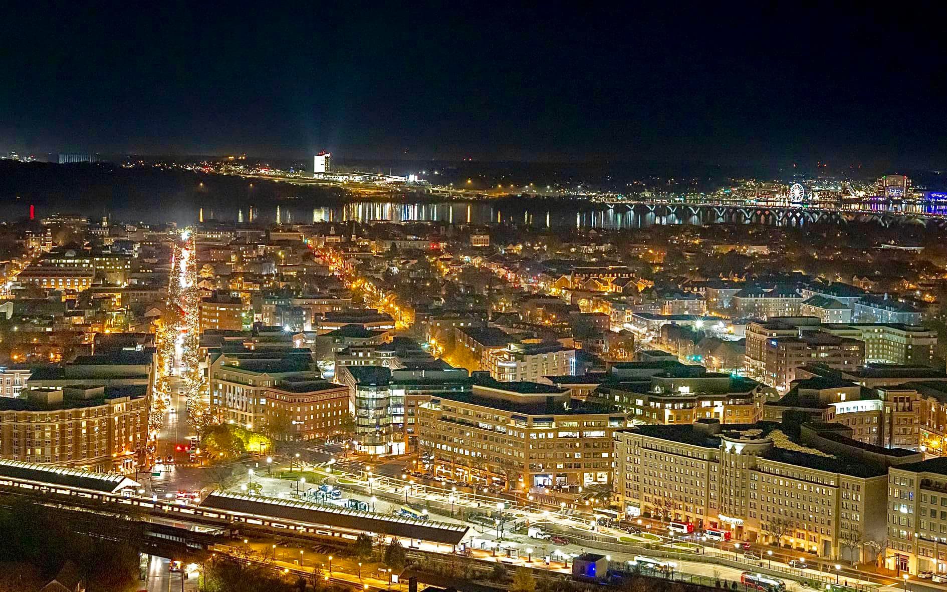 Nighttime arial photo of Old Town Alexandria all aglow taken by Ted Hovis atop the Masonic Memorial. 