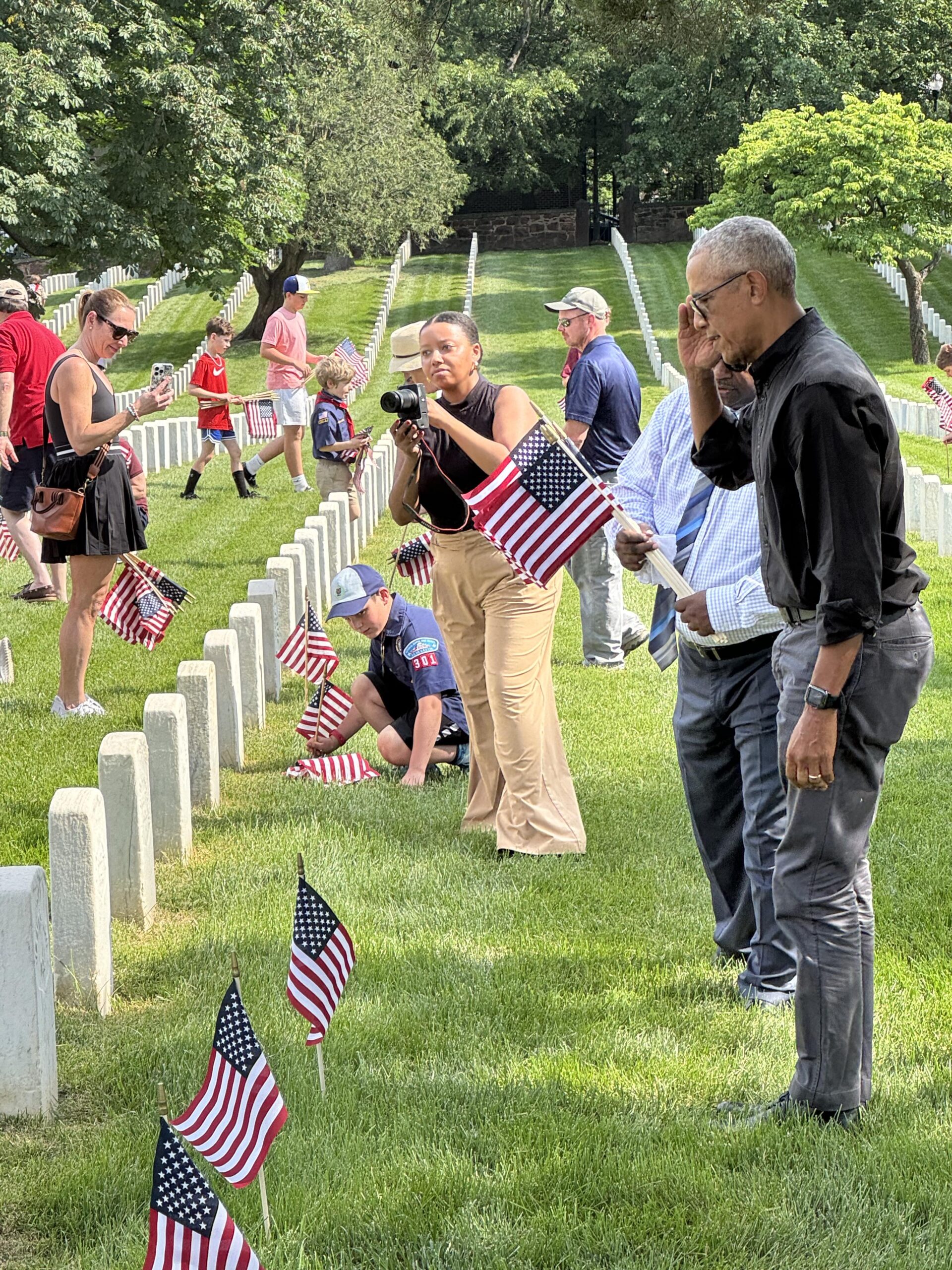 President Obama salutes grave.