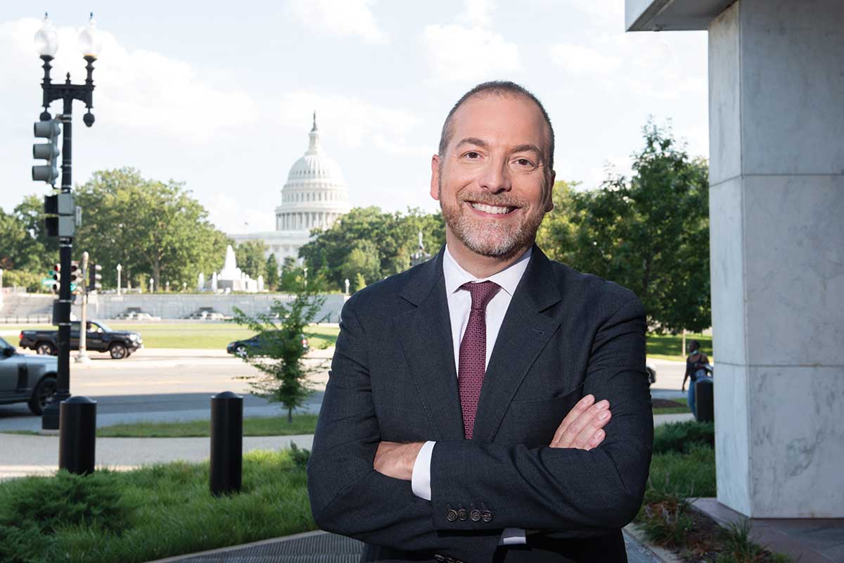Chuck Todd Man at news desk with Washington capitol behind him