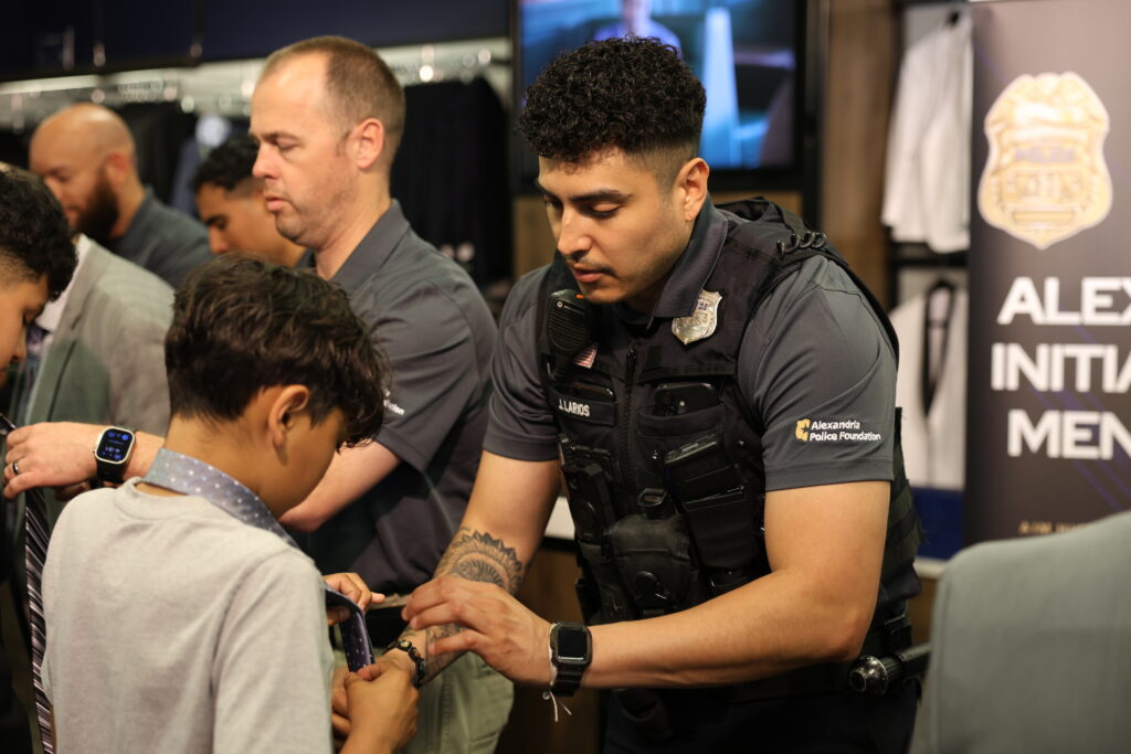 Pic 1 police officer helping child