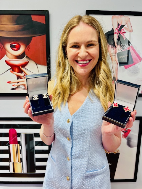 blond woman displays jewelry