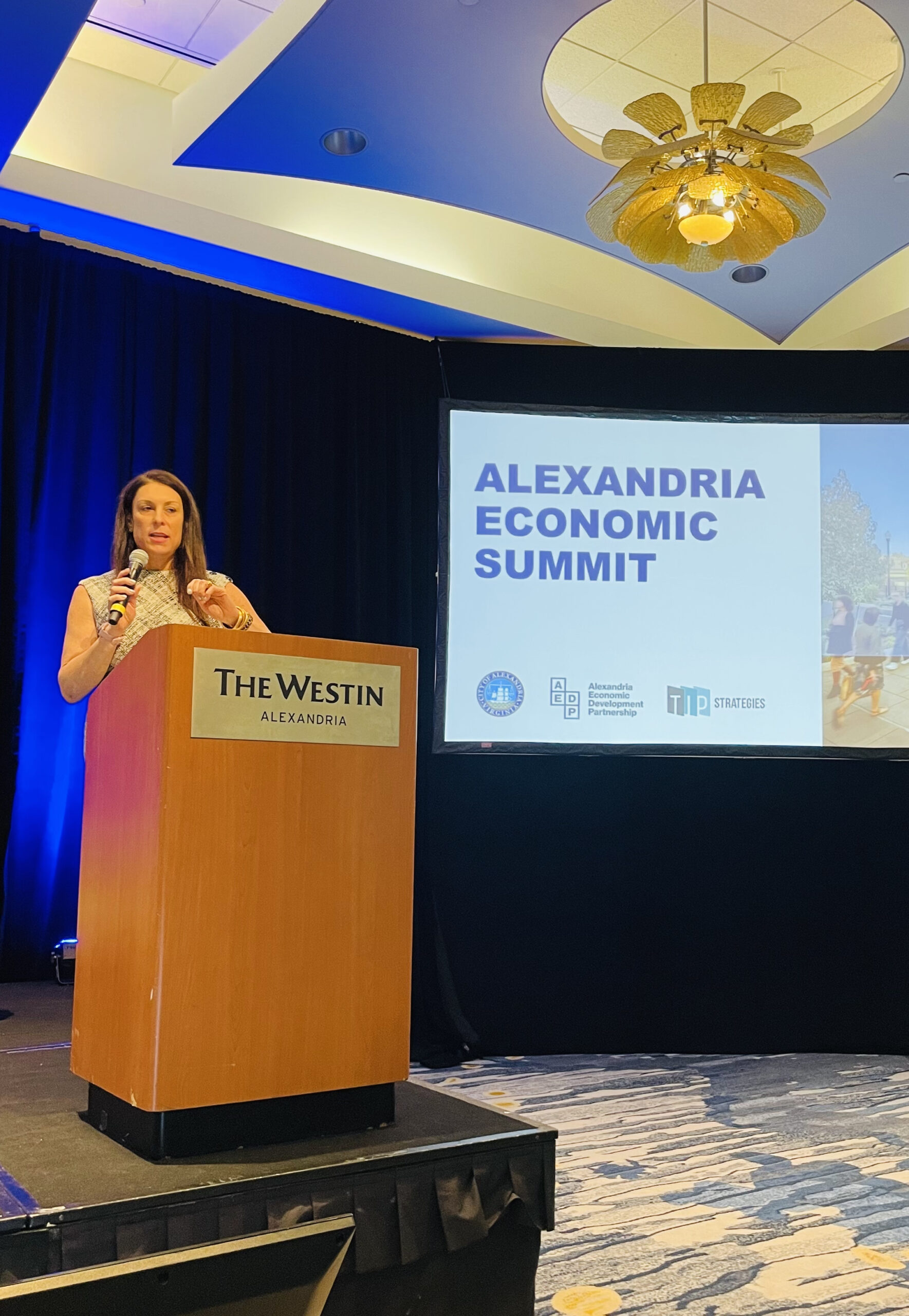 1. AEDP CEO&President Stephanie Landrum AED President/CEO Stephanie Landrum at the podium during the 2025 Alexandria Economic Summit