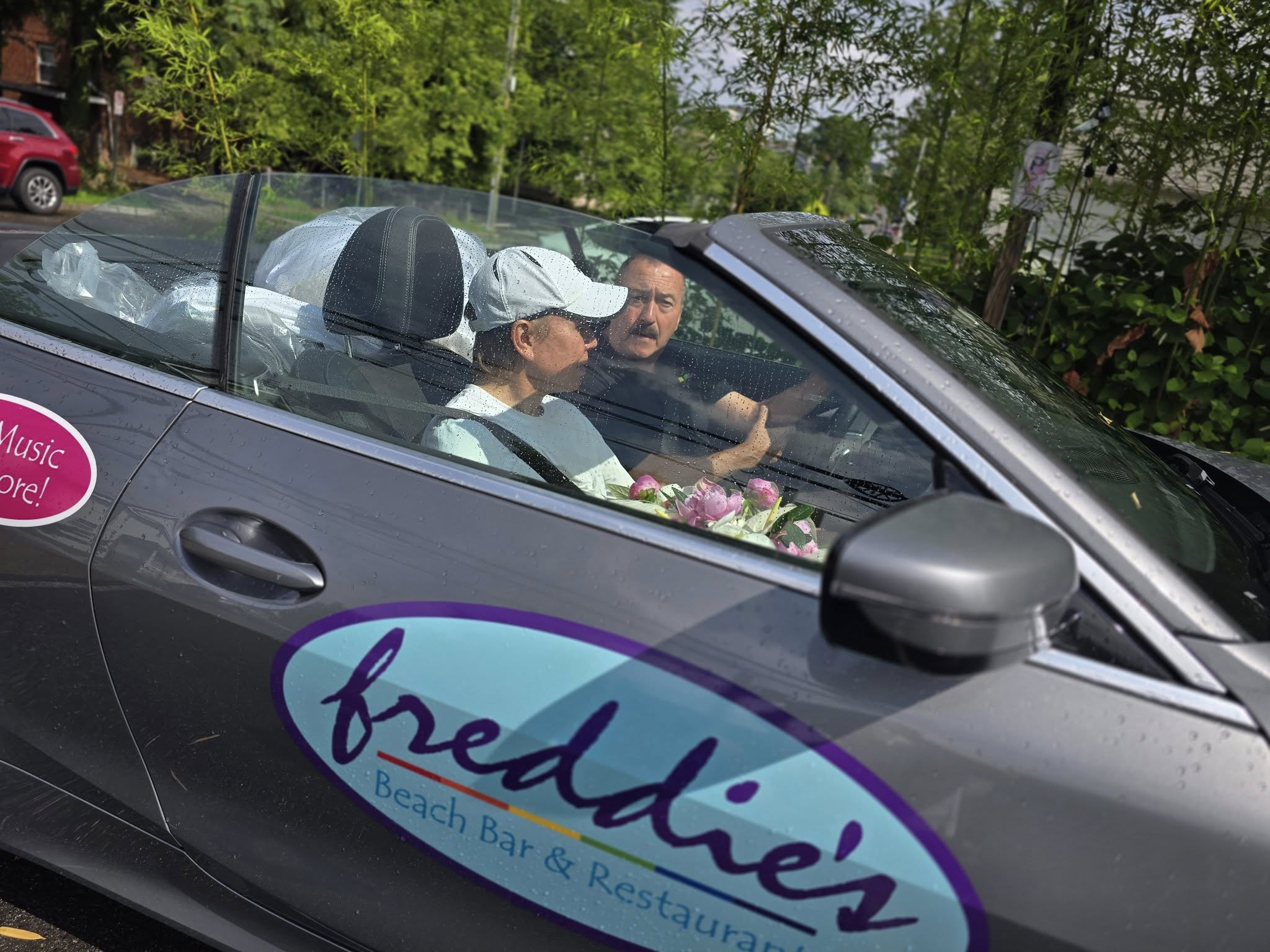 Royce Cohen and Freddie Lutz with wedding flowers wedding flowers