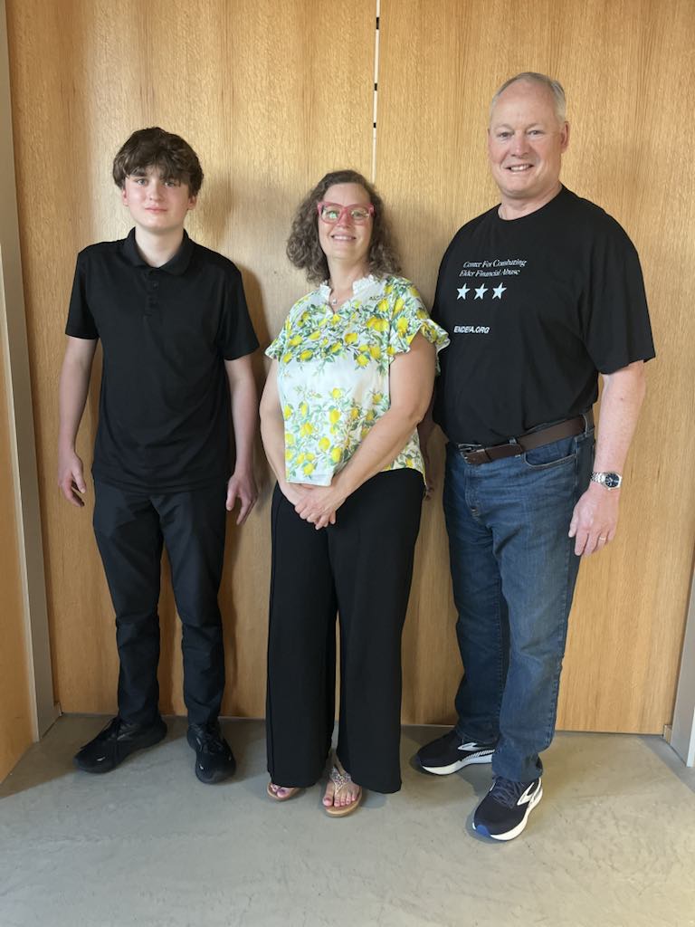 Shielding Seniors from Online Scams Photo Wesley Driscoll poses with Lemonaide founder Vanessa Engelhardt and former FBI agent John Schwartz. (Courtesy photo)