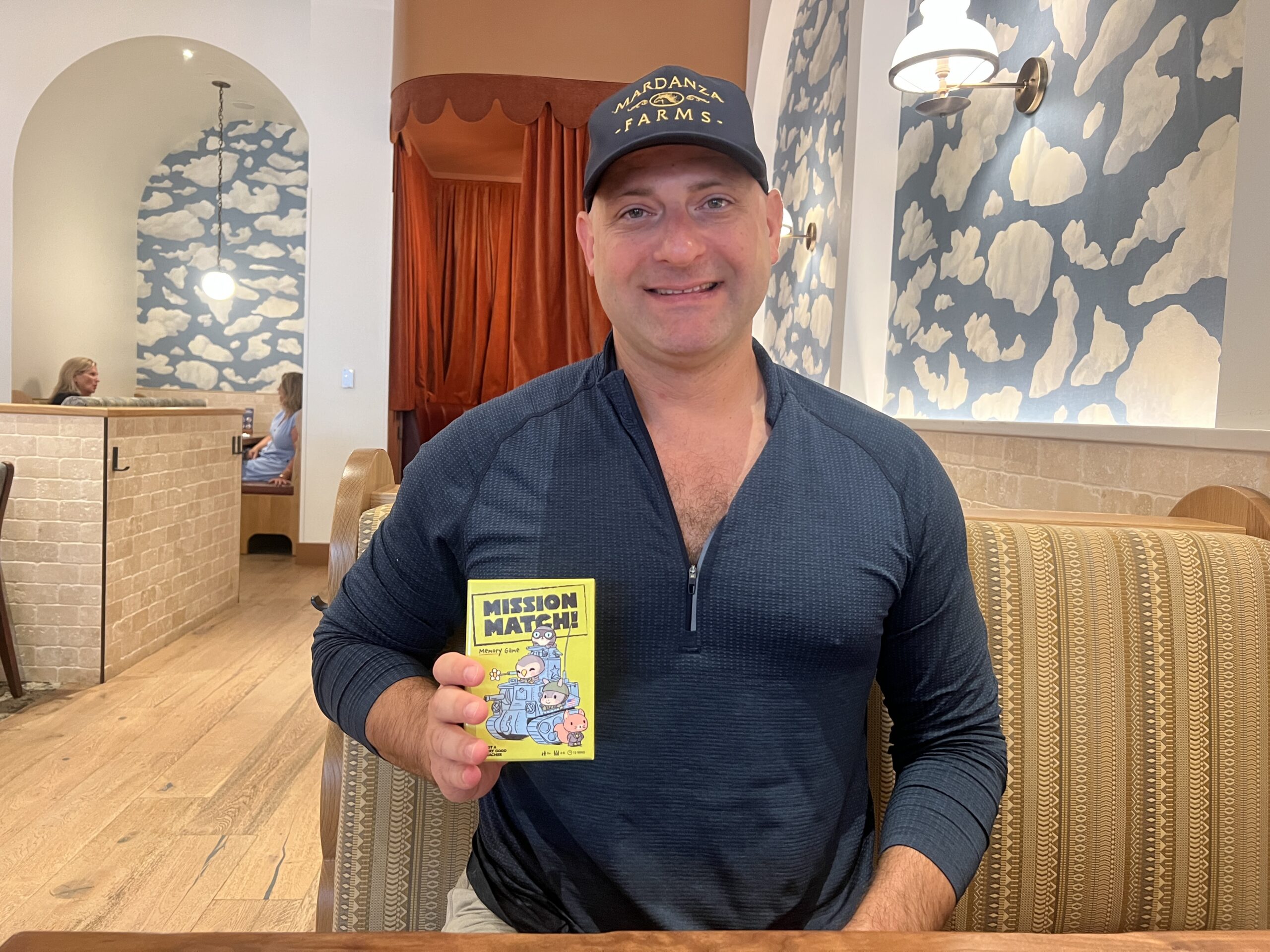 Timothy Gick poses with a demo version of Mission Match Courtesy photos