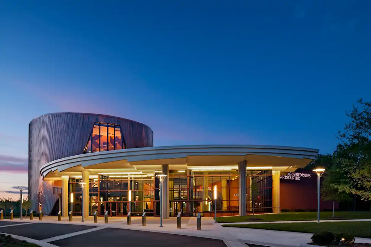 Hylton Performing Arts Center Hylton Performing Arts Center building with blue sky in background lit up a dusk