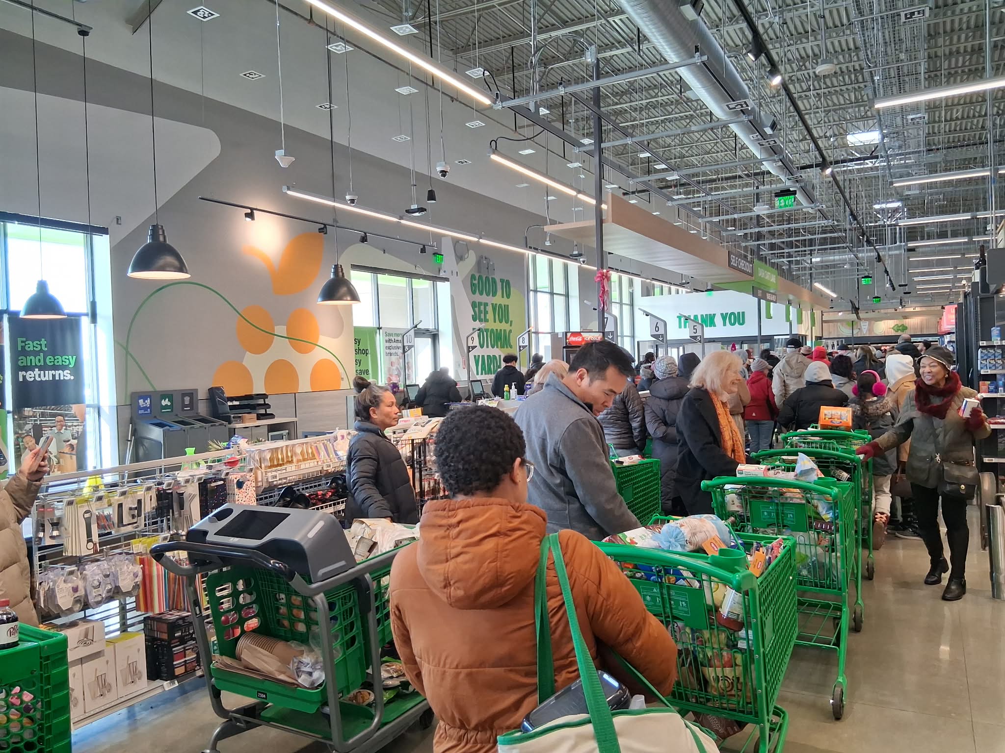 Amazon Fresh in Alexandria Va Shopping carts lined up with people waiting at Amazon Fresh in ALexandria Va