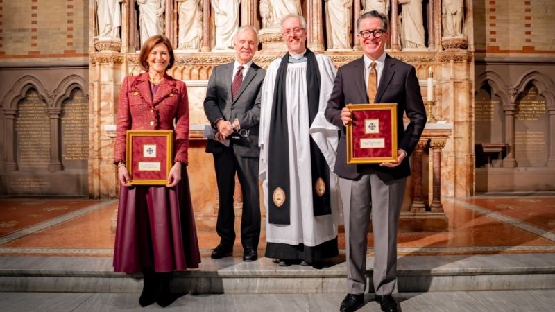 Stephen Colbert and wife with award