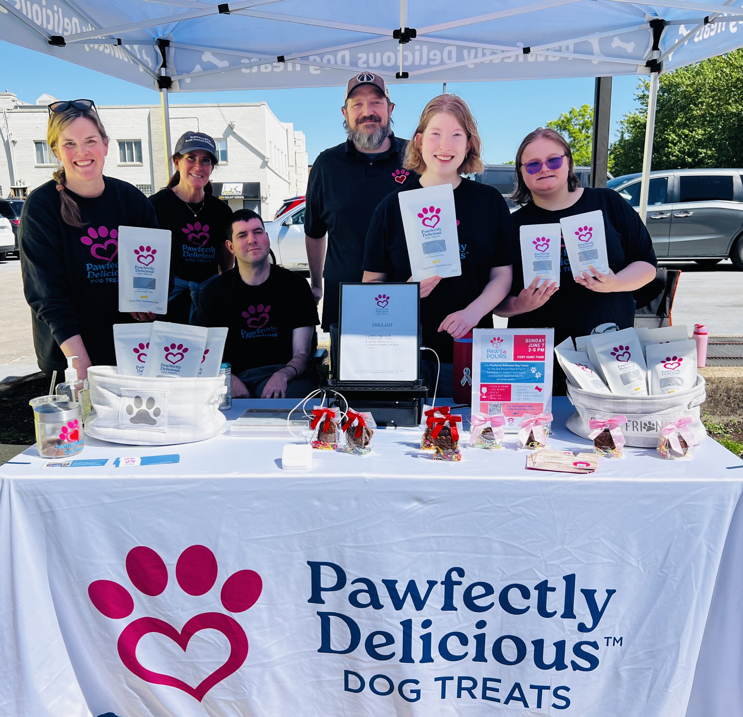 The Pawfectly Delicious Dog Treats team is happy to provide your fur-babies with healthy treats made by special people. L-R: Darcy Kohn, Anne Tuccillo, Bryan Tuccillo, Charlie Flynt, Ginny McMahon, Lizzy Buchanan