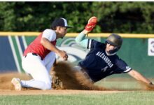 Alexandria Aces runner Daniel McGinnis slides through a cloud of dust as a South County Braves infielder attempts a tag during a Cal Ripken League game at Frank Mann Field.