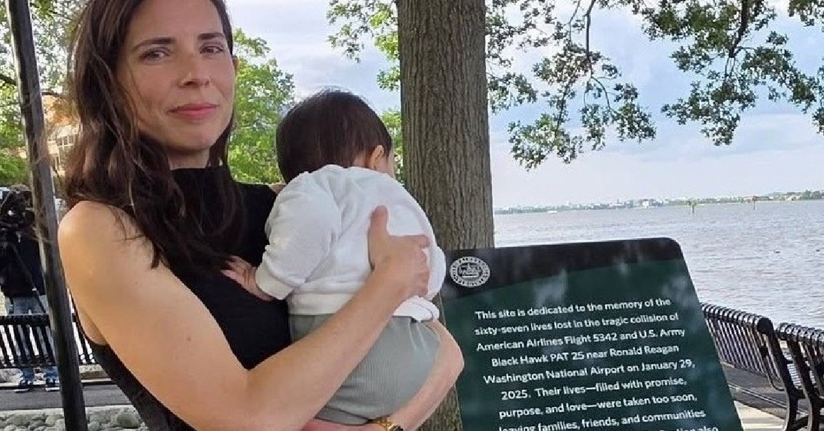 Audrey Patel stands beside the memorial erected at Rivergate City Park on the Old Town waterfront. Her husband Vic died in the crash when she was just two weeks pregnant with their child. Photo: Judith Fogel/Zebra Press
