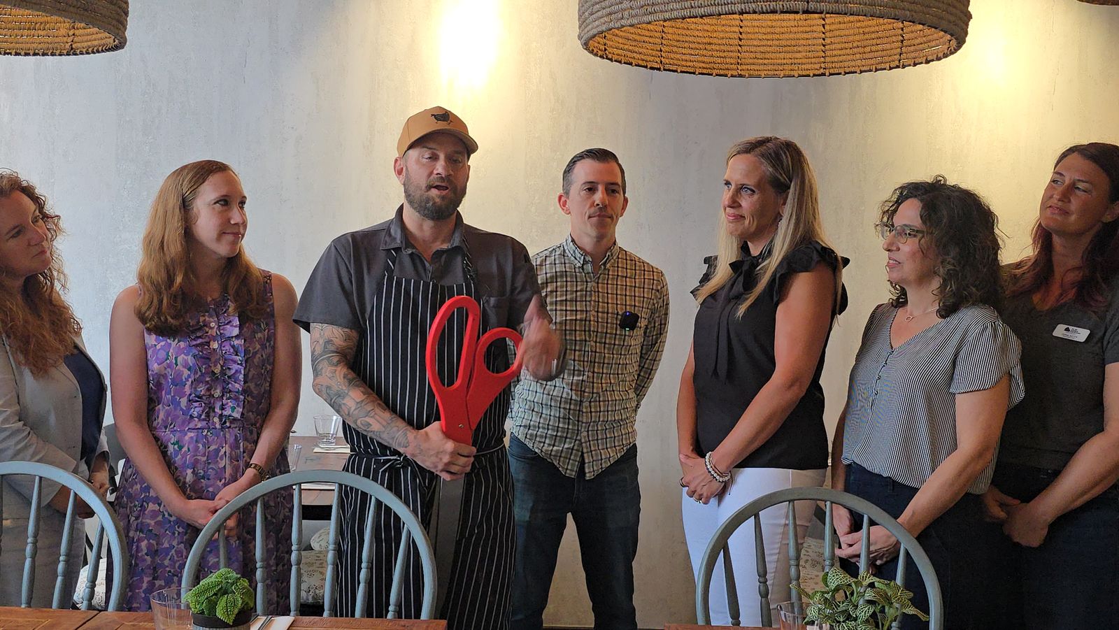 Chef Eric Brannon Addresses Guests at Little Birdie Opening Chef Eric Brannon speaks to guests and community leaders during the grand opening celebration for Little Birdie in Alexandria's Del Ray neighborhood.