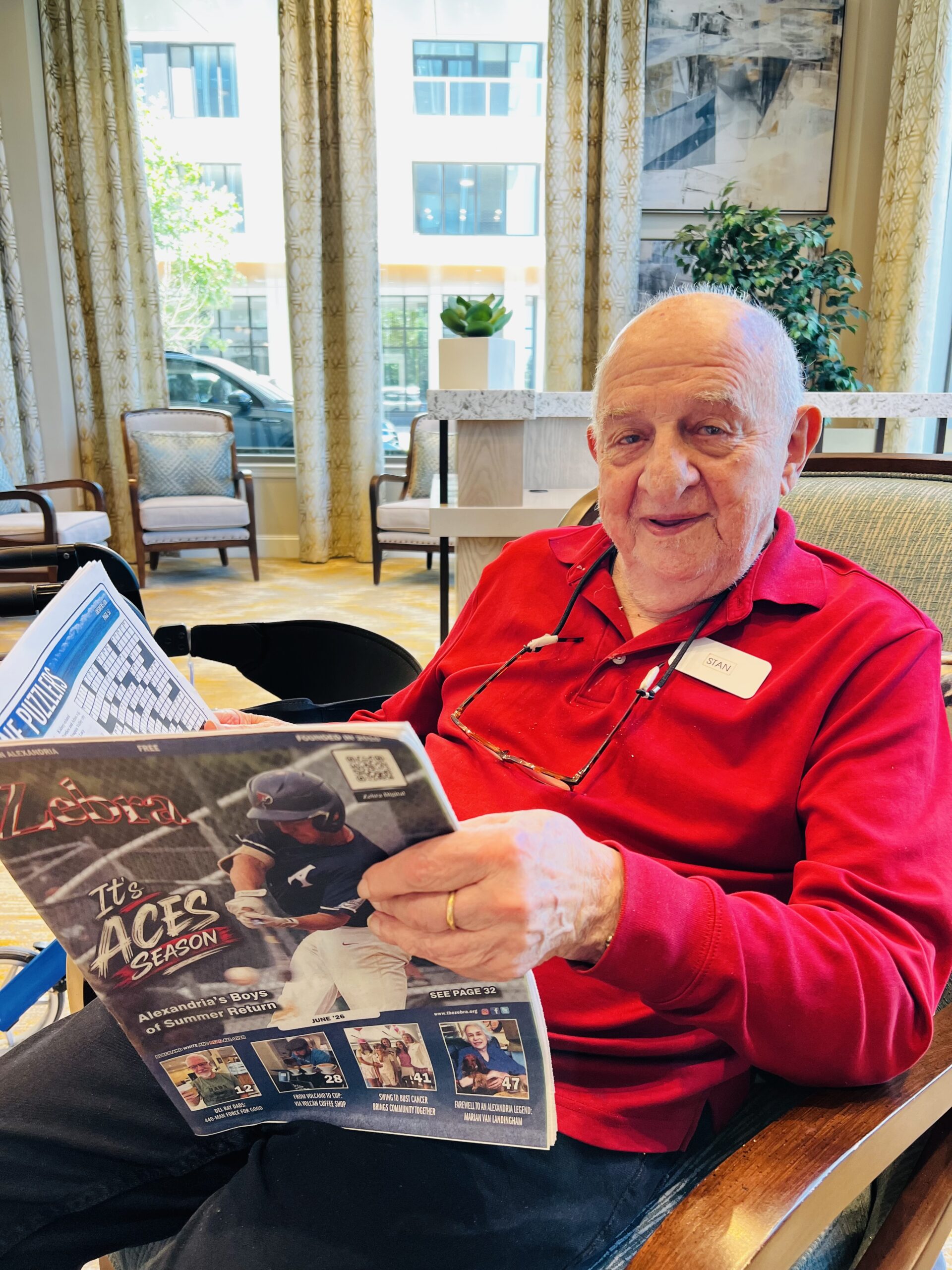 stan kolker Stan Kolker, 97, reads the June issue of The Zebra Press at The Landing in Alexandria. Earlier this year, Kolker shared a simple wish: he wanted to start a glee club. That idea sparked an eight-week partnership with The Alexandria Singers and culminated in a heartwarming concert featuring residents from memory care, assisted living, and independent living. Photo: Lisa-Helene Lawson