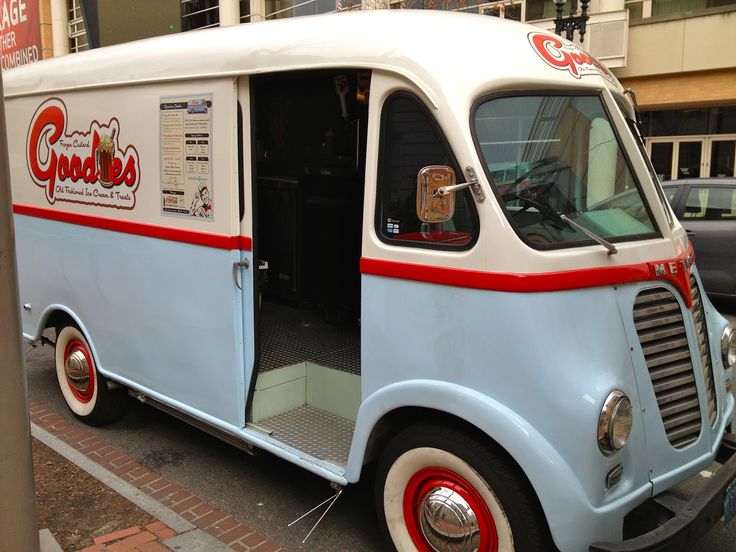 Goodies Frozen Custard’s Vintage “Gigi” Van Goodies Frozen Custard & Treats’ restored vintage Metro van, known as “Gigi,” parked along a city street.