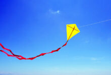 Hello kite flying in air.