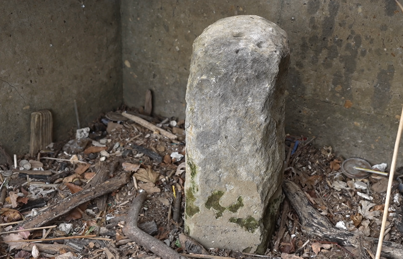 Jones Point Boundary Stone Weathered 1791 South Cornerstone visible below its protective grate at Jones Point Park