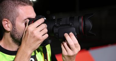 Photographer with Canon 24-105mm F2.8 RF L IS USM Z and Power Zoom adapter