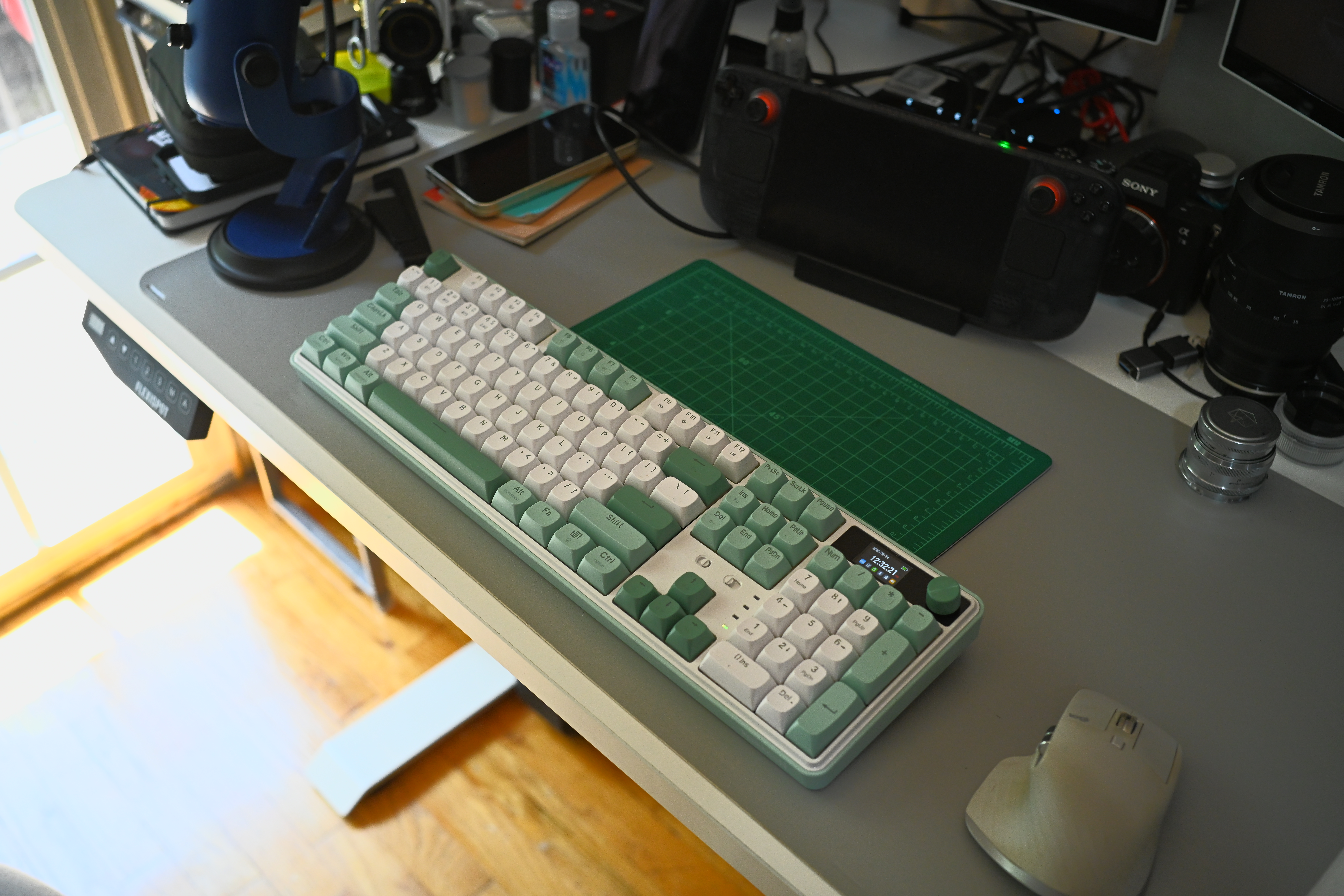 The WYVERN K761 Pro full-sized wireless mechanical keyboard sits on a sun-drenched workspace.